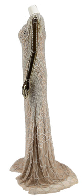 Aura Elegance Gallakjole fra DressDesires set fra siden - Viser kjolens graciøse fald og elegante linjer, ideel til formelle lejligheder.