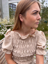 Hvide dråbeformede øreringe
