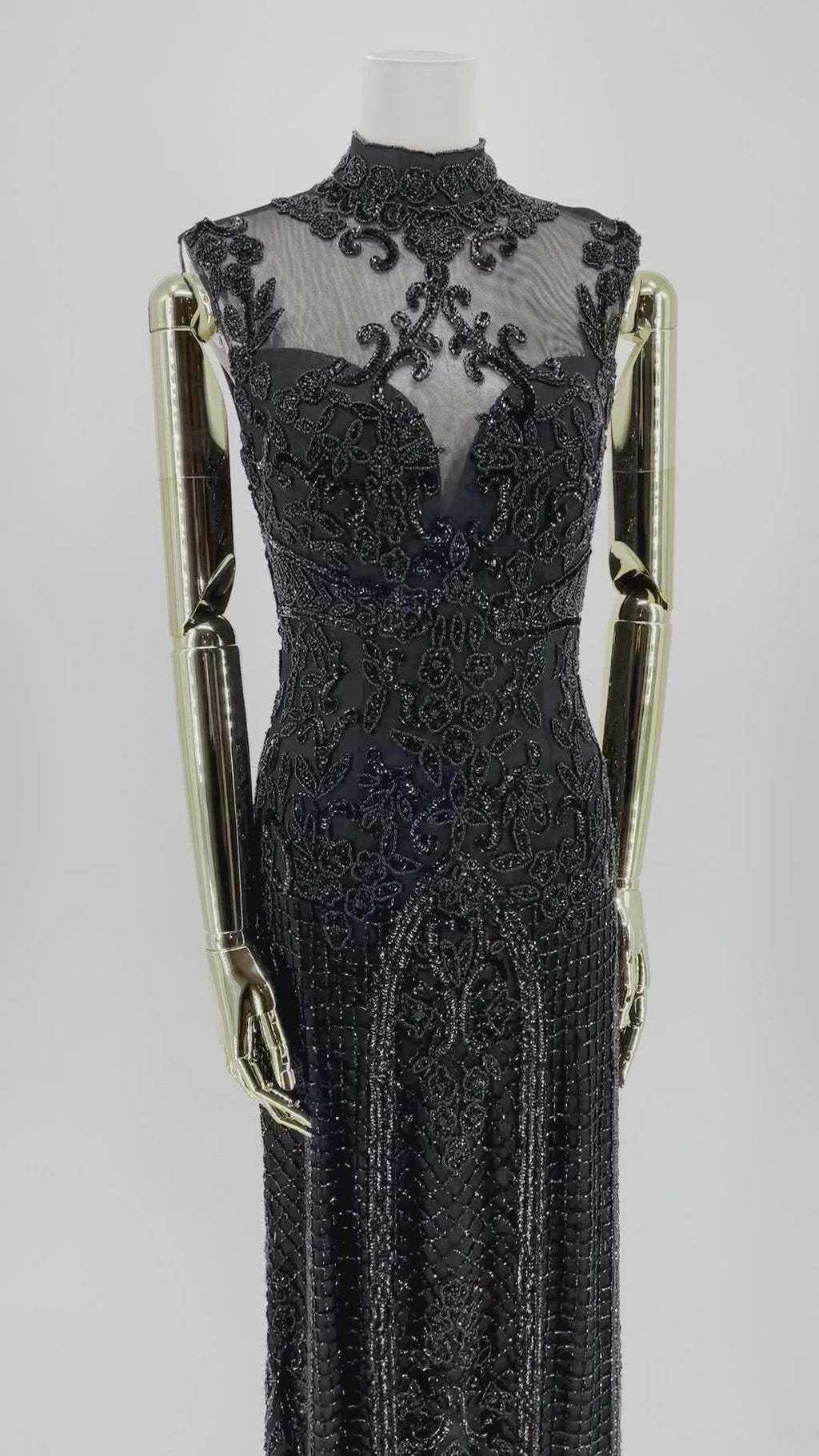 Detaljeret nærbillede af Natskygge Elegance Gallakjole, fokus på det fine håndarbejde og de eksklusive detaljer, der definerer kjolens luksuriøse æstetik.